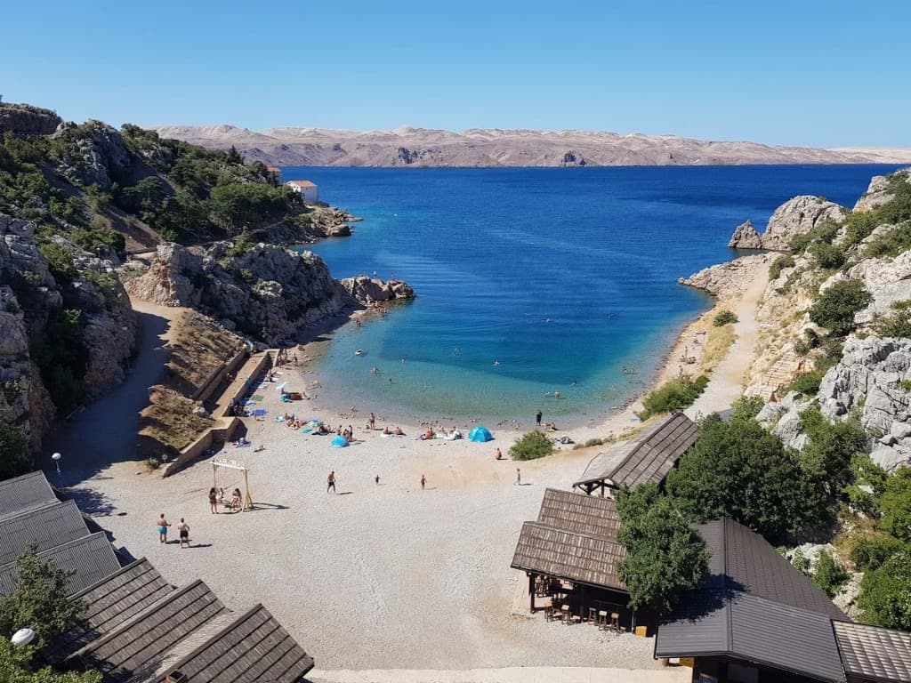 Tatinja cove near Karlobag — pebble beach and Adriatic view, half an hour from Stars Peak